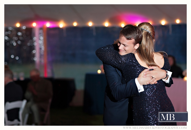 groom and mother dancing at wedding reception