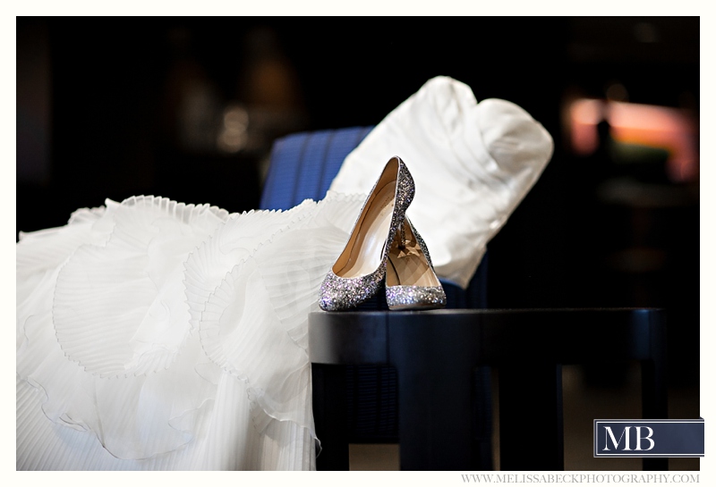 wedding dress and silver sparkle wedding shoes