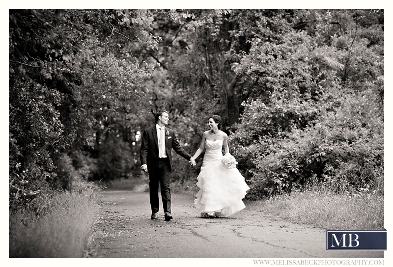 bride and groom portraits on a dirt path