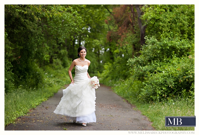 bride walking on a dirt road