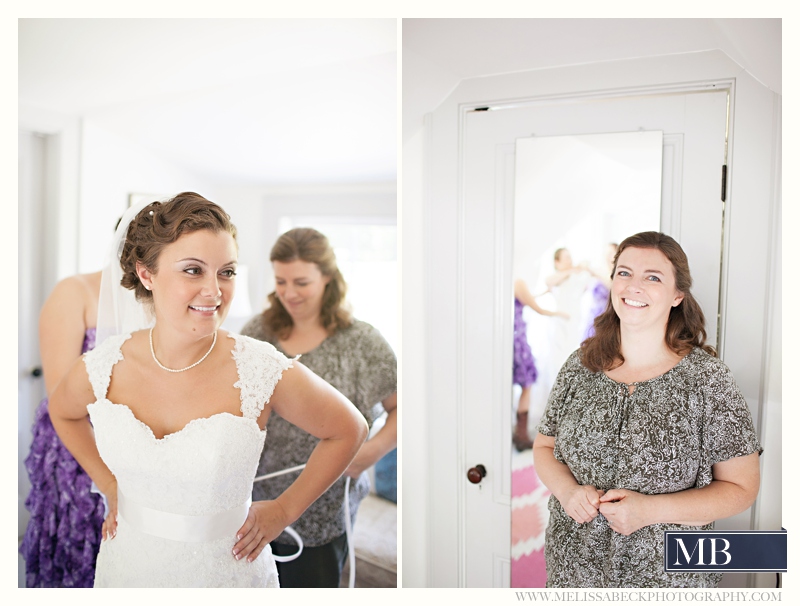 bride getting ready the barn at flanagn farm maine wedding